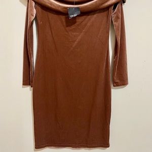 Velvet material. Off the shoulders, long sleeve.